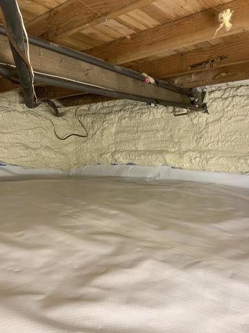 spray foam installed in small corner below house