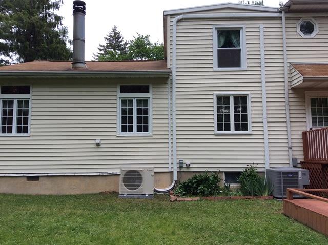 new ductless HVAC unit outside customers house