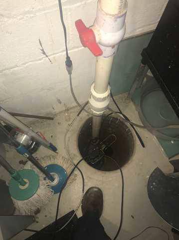 cleaning and doing maintenance on a sump pump
