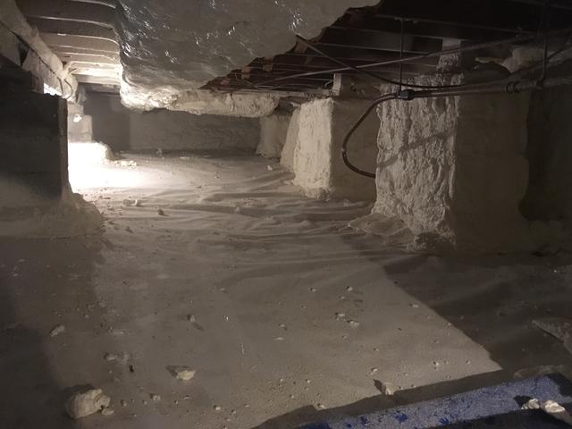 Spray foam sprayed in crawl space